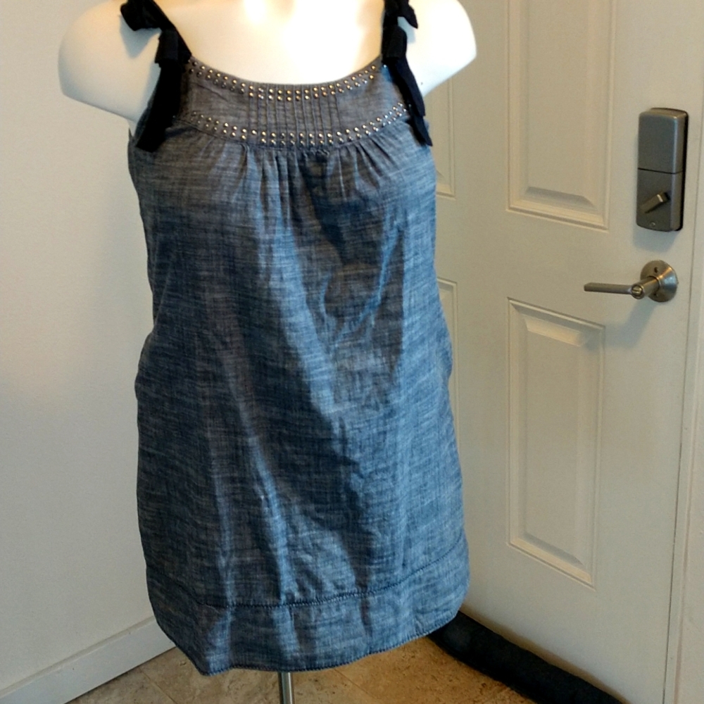 Denim chambray sun dress with grommets on neckline and pockets!